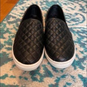 Girls black cushion slip on sneakers